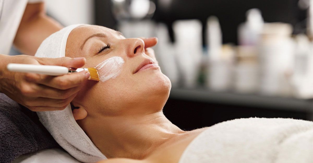 Woman enjoying a professional facial treatment